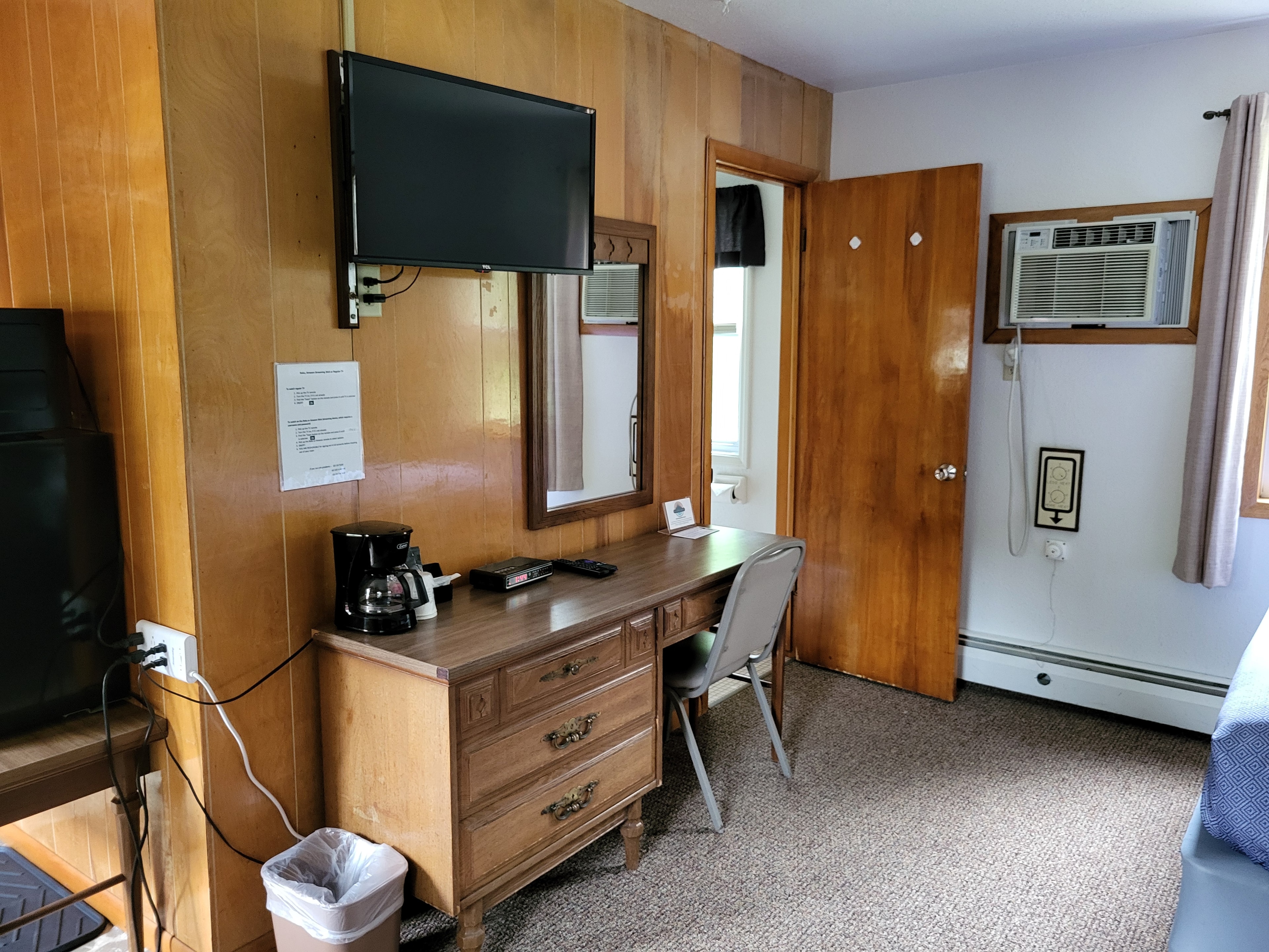 Cozy cabin room with wood paneling