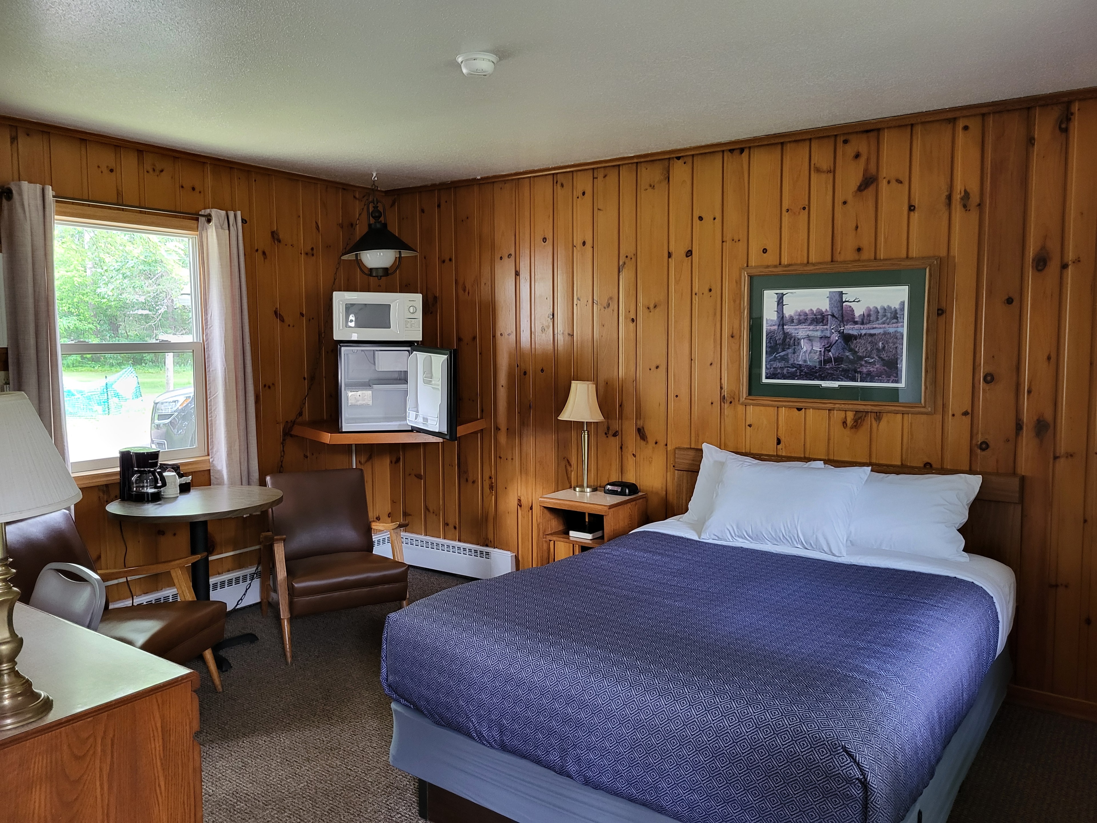 Bright hotel room with two queen beds