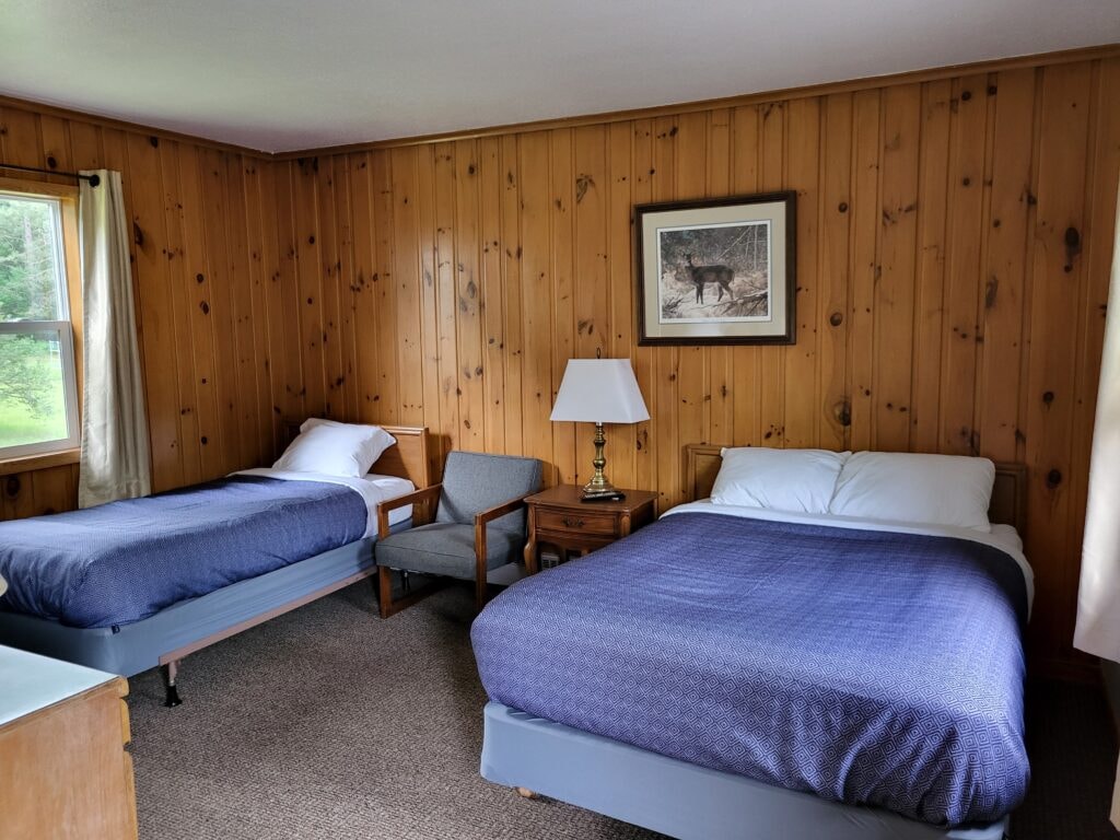 Motel bathroom with woodland shower curtain