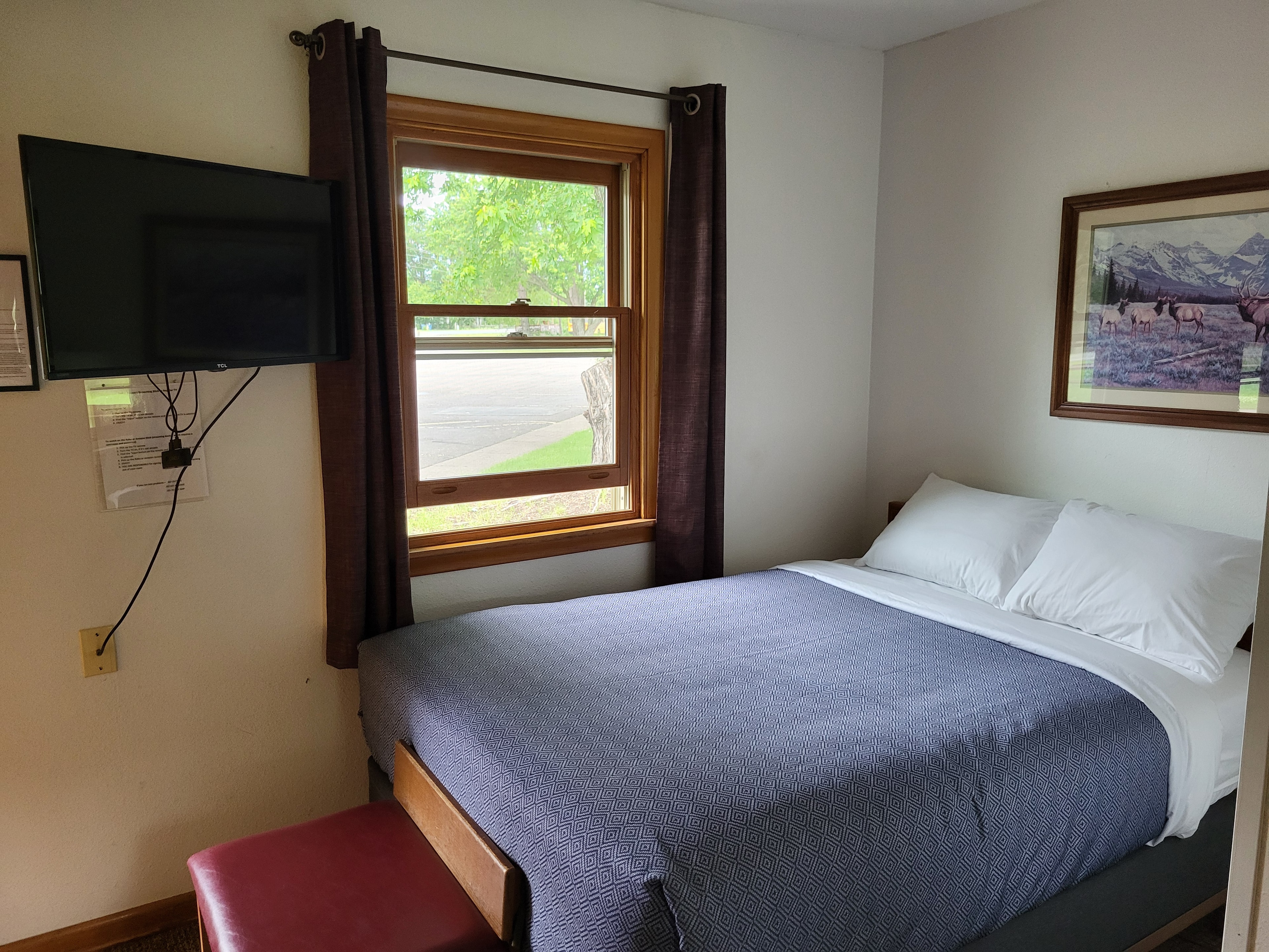Pine Wood Motel Room 10 — single bed with window