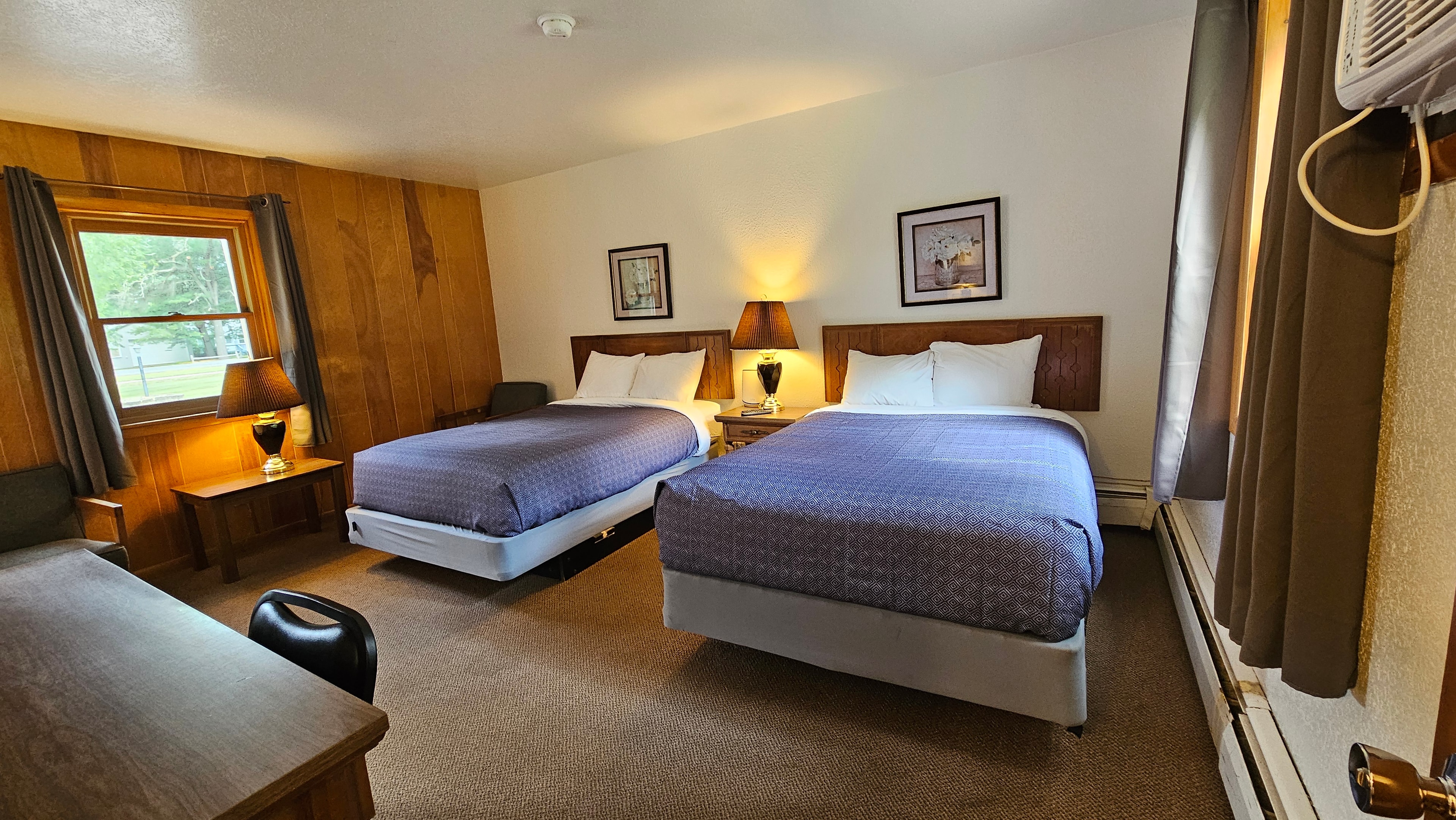 Pine Wood Motel Room 14 — queen bed with blue comforter